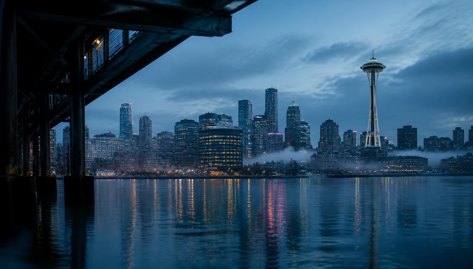 Seattle skyline at blue hour across Puget Sound
